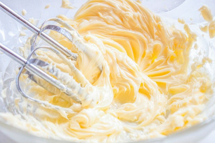 Why does milk turn into butter when frothed?